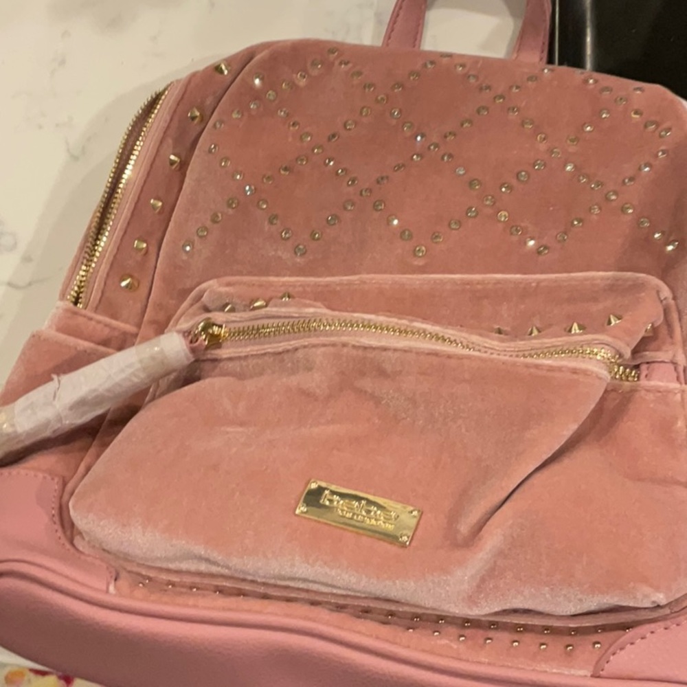Bebe pink velvet backpack with rhinestones and gold hardware nwt!!Firm
